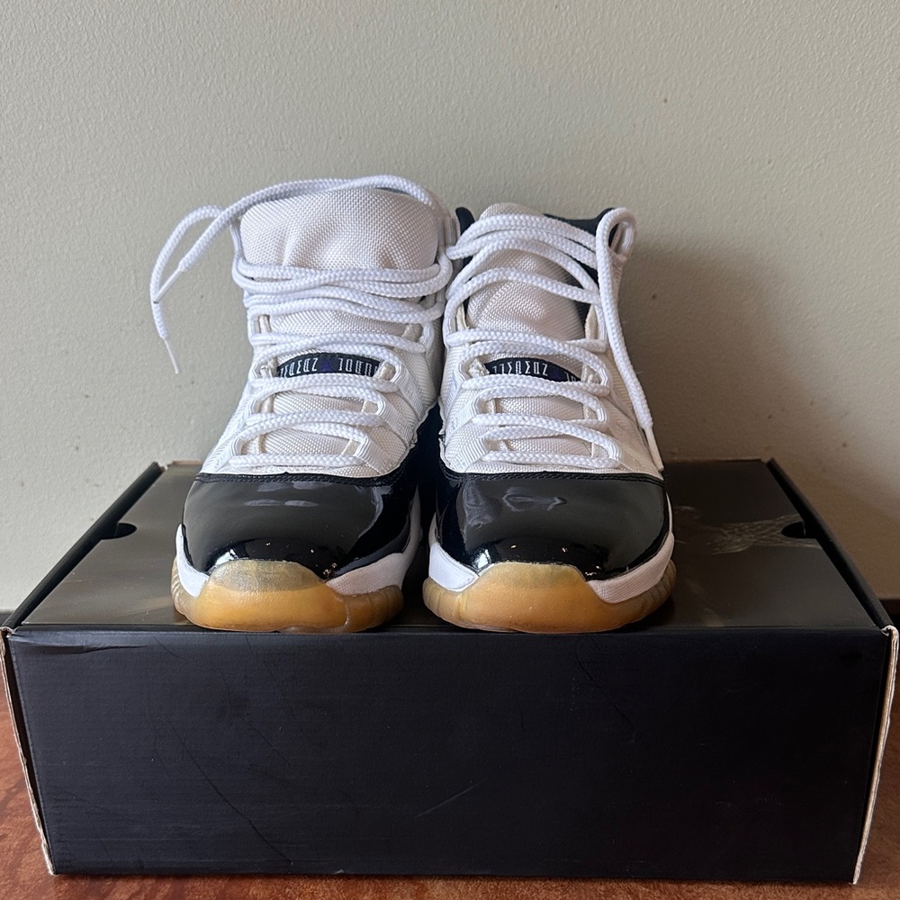 Air Jordan 11 Men’s Black and White Sneakers with the box’s.